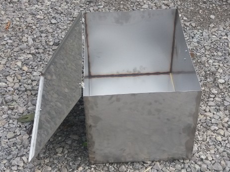 Box with opened cover made of stainless steel