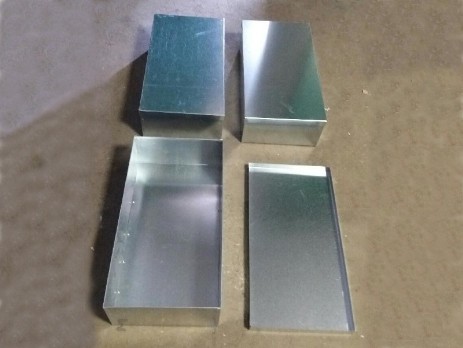 Boxes with covers made of galvanized steel