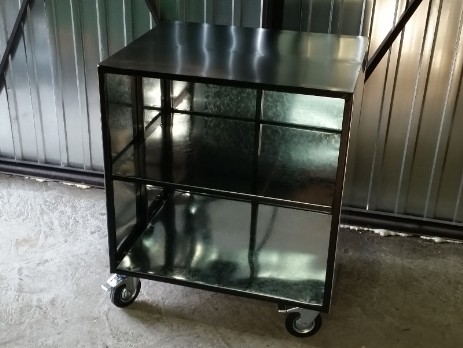 Metal table with wheels