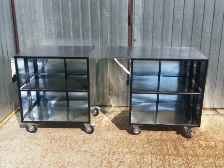Metal tables with shelves on wheels